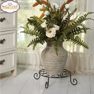 Artisanal Metal Trivet and Floor Saucer: A Stylish Solution for Indoor and Outdoor Plant Support