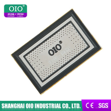 OIO Wholesale Heat Popular Decorative Practical Injection Technics Label With Embossed Logo For Garments