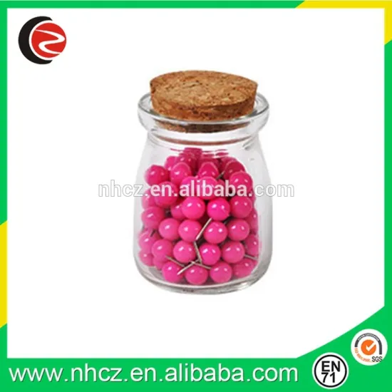 Round Pink Push pin in glass bottle