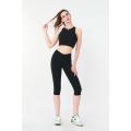 Ladies Yoga Pants Black Body-hugging Mid-length Yoga Tights Supplier