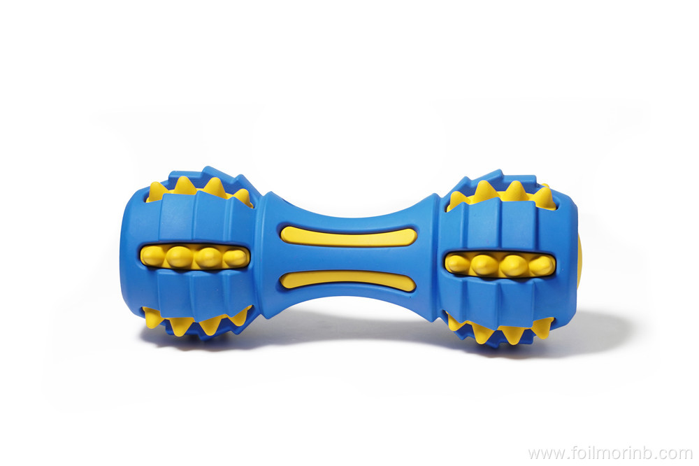 Teeth cleaning dog chew toy with bell inside