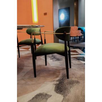 Silla de comedor verde de lujo con pierna de metal
