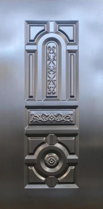 Decorative metal door panel