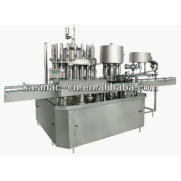 Rotary filling and capping machine