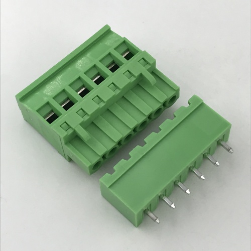 Vertical straight pin connector beside sealed terminal block