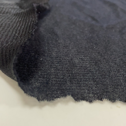 100%polyestertricot med OneSide Brush Knit Tyg