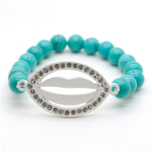 Bracelet de pierres précieuses étirées de perles rondes turquoise 8MM avec morceau de lèvre Diamante