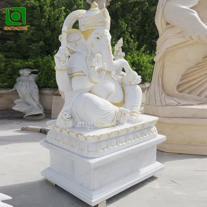 White Marble Ganesha Statue with Golden Accents