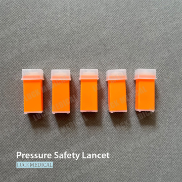 Lancetas de seguridad activadas por presión desechable