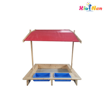Sandbox with sun canopy and water tank