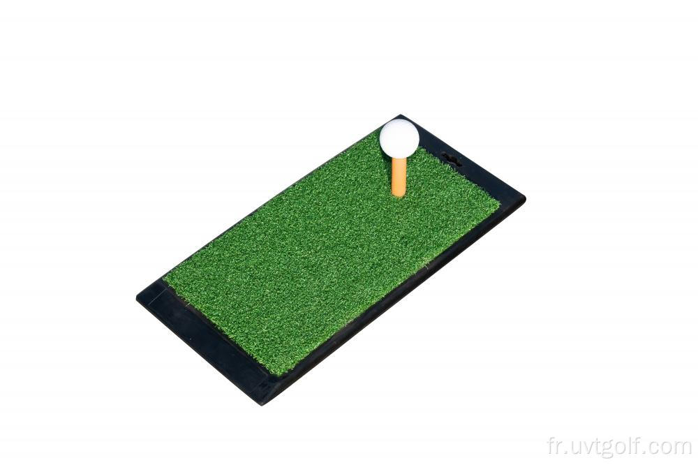 Mini golf portable mettant le tapis vert