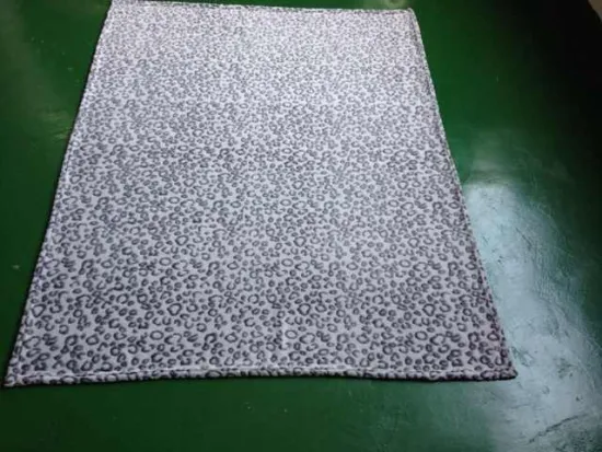 gray color throw fleece blanket