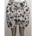 Shorts de playa para hombres con estampado de árboles