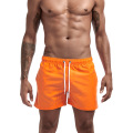 Shorts esportivos masculinos de laranja personalizados