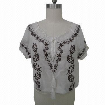 Cotton blouse with embroidered hem