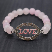 Bracelet de pierres précieuses tendues avec perles rondes de quartz rose 8MM avec pièce d&#39;amour Diamante