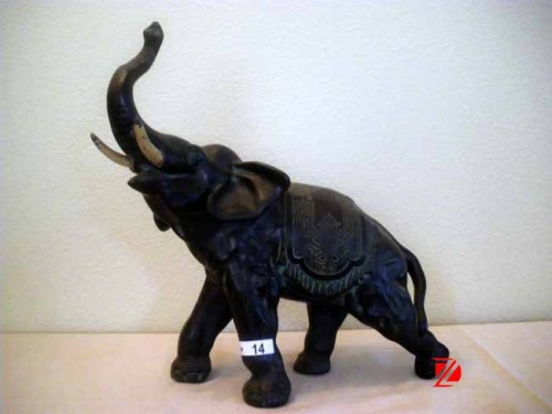 Copper metal elephant sculpture