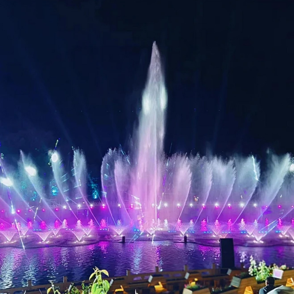 Fonte dançante de música flutuante no lago