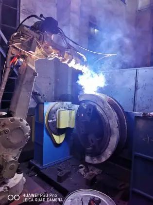 Energy-Saving and Efficient Automatic Welding Robot with Upgraded System