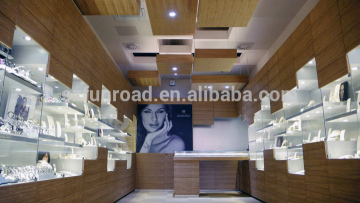 Jewelry concept store designs wooden cabinet with glass top showcase and LED lighting