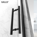 Puerta de ducha corredera enmarcada en marco negro de baño Sally