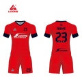 Jersey de fútbol de fútbol negro y rojo personalizado