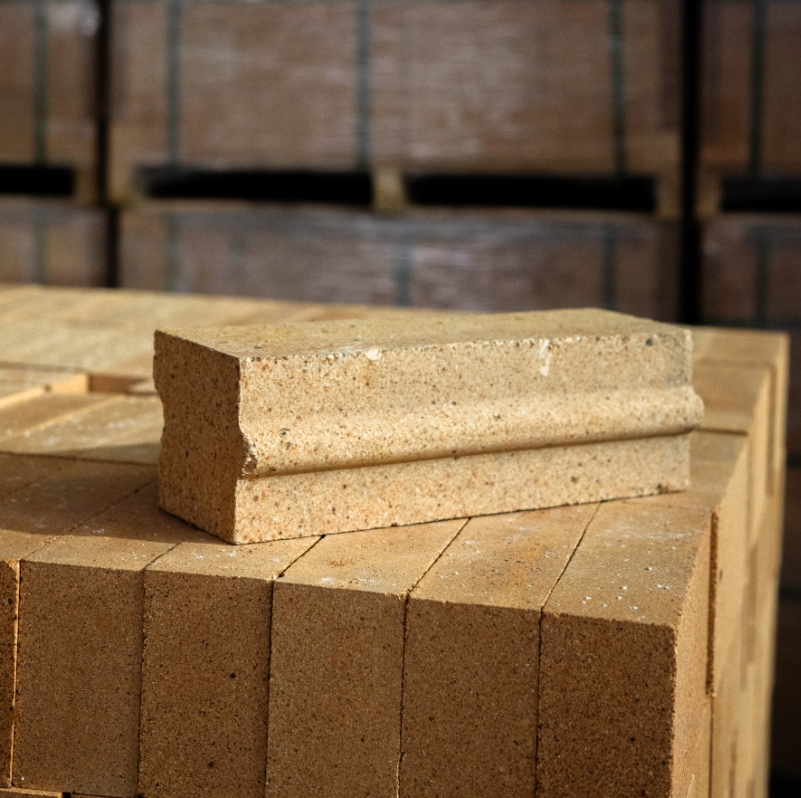 Shaped refractory bricks