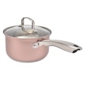 Casseruola con pentole da cucina sul coperchio set rosa