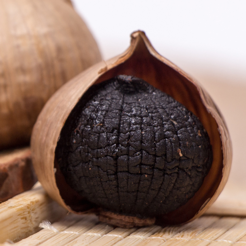 peeled single bulb black garlic