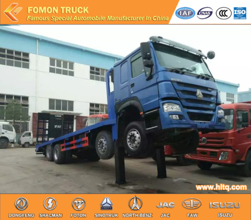 SINOTRUK 8X4 LHD front lifting flatbed truck