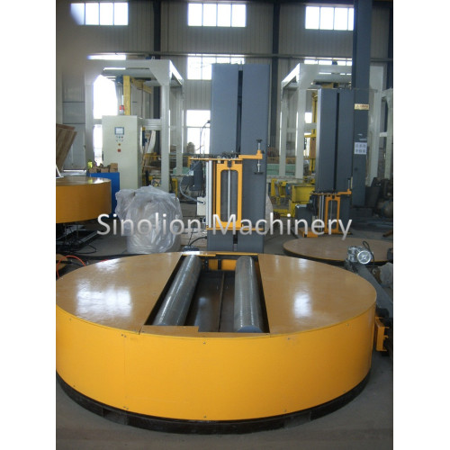 Reel Stretch Wrapper with Top Platen Device