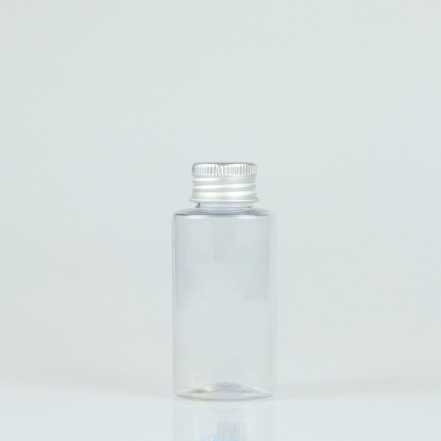 Flat oval plastic pet bottle with aluminum cap