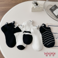 Adorables calcetines de botes bordados de panda