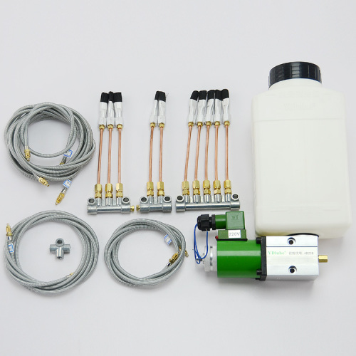 Conjunto de lubricador automático para escaleras mecánicas