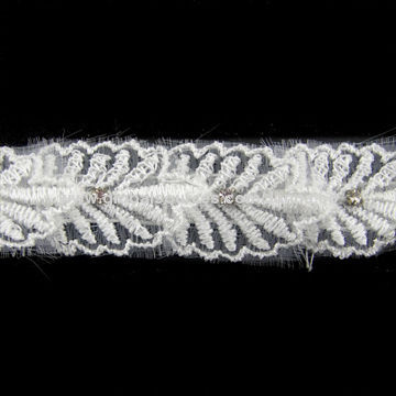 Lace trimming, made of white lace and rhinestone, available in various designs