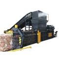 Horizontal hydraulic automatic carton baler machine