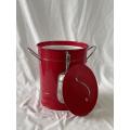 Red ice bucket with aluminum spatula and lid