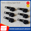 Nylon clothing zipper head