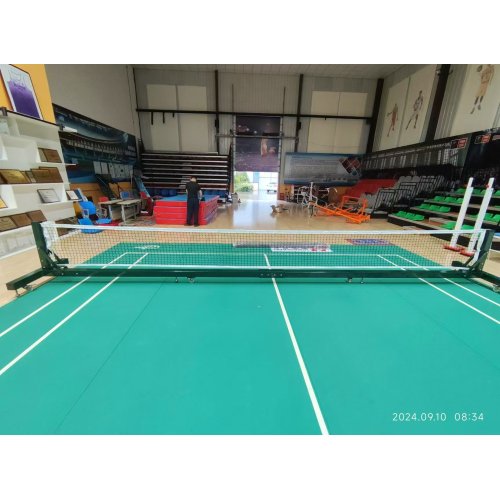 Movable pickle ball post