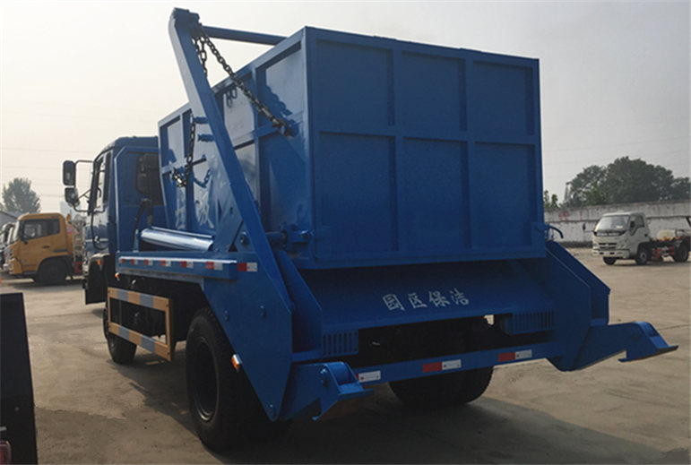 SWING ARM GARBAGE TRUCK