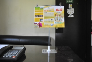"T" POP UP poster display on the table