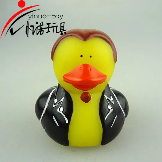 EN71 Eco-friendly pvc material mini yellow duck with brown hair and black dress squirt toy customize eco-friendly toy