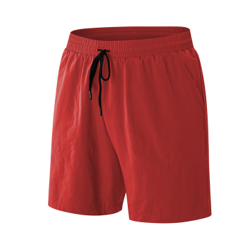 Allenamento all'ingrosso 2023 in poliestere spandex che gestisce pantaloncini atletici da uomo con caratteristiche rapide secche e riflettenti