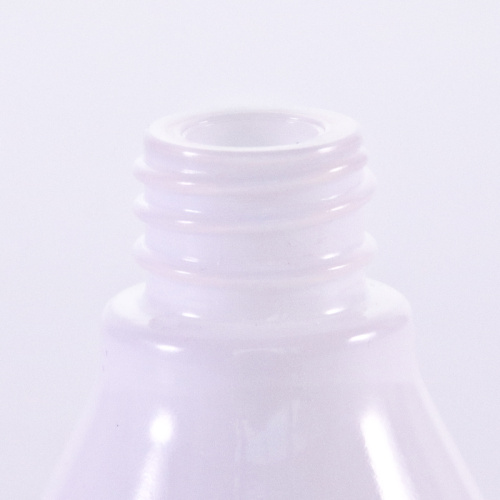 Spezielle Form weißer Serumflasche mit silbernen Tropfen