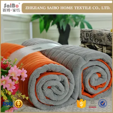 Plain orange coral piping edge blanket