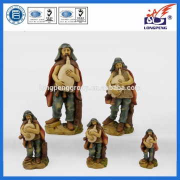 Nativity figurine 15cm, bagpiper player with red mantle