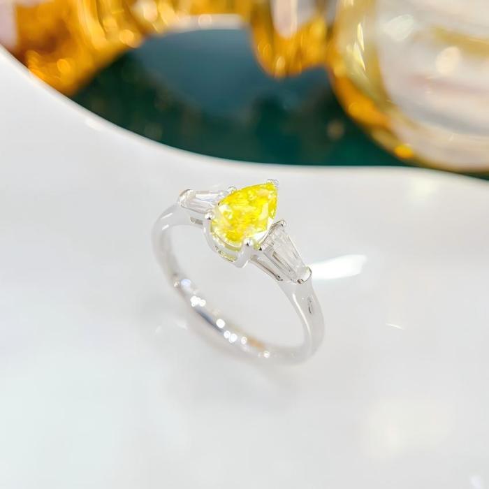Anillo baguette cónico con diamante de laboratorio en forma de pera amarilla