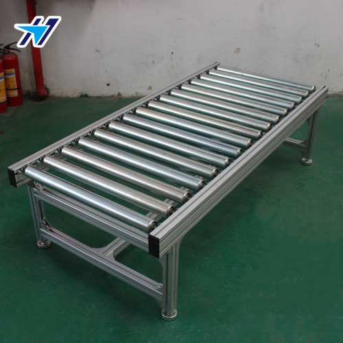 Short unpowered roller conveyor