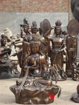 bronze kwan yin statue with vase and wicker