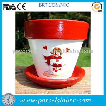 snowgirl on hand-painted christmas plant pots